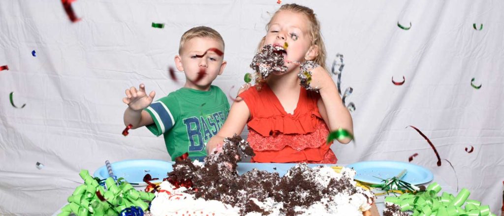 Kids destroying cake